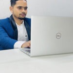 A man with dell Laptop